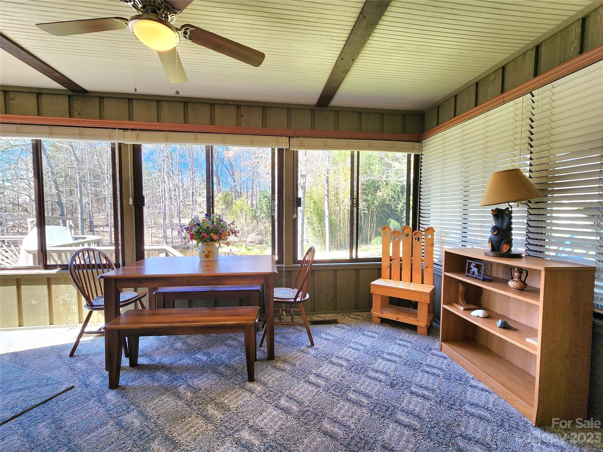 1101 Running Brook Road Midland, NC 28107 - Photo 29 of 48 a living room with furniture a window and a table