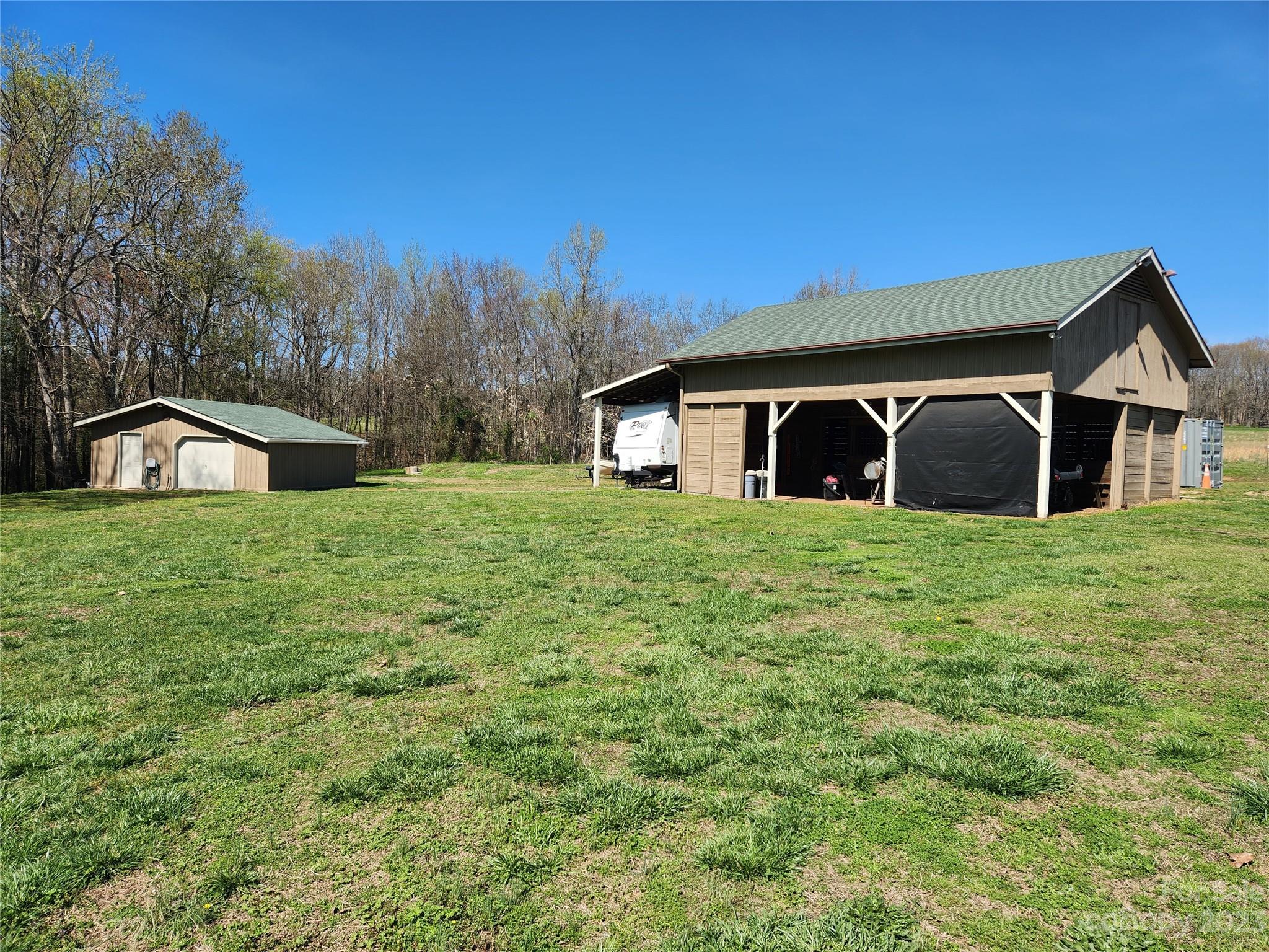 1101 Running Brook Road Midland, NC 28107 - Photo 40 of 48 a view of a house with a yard
