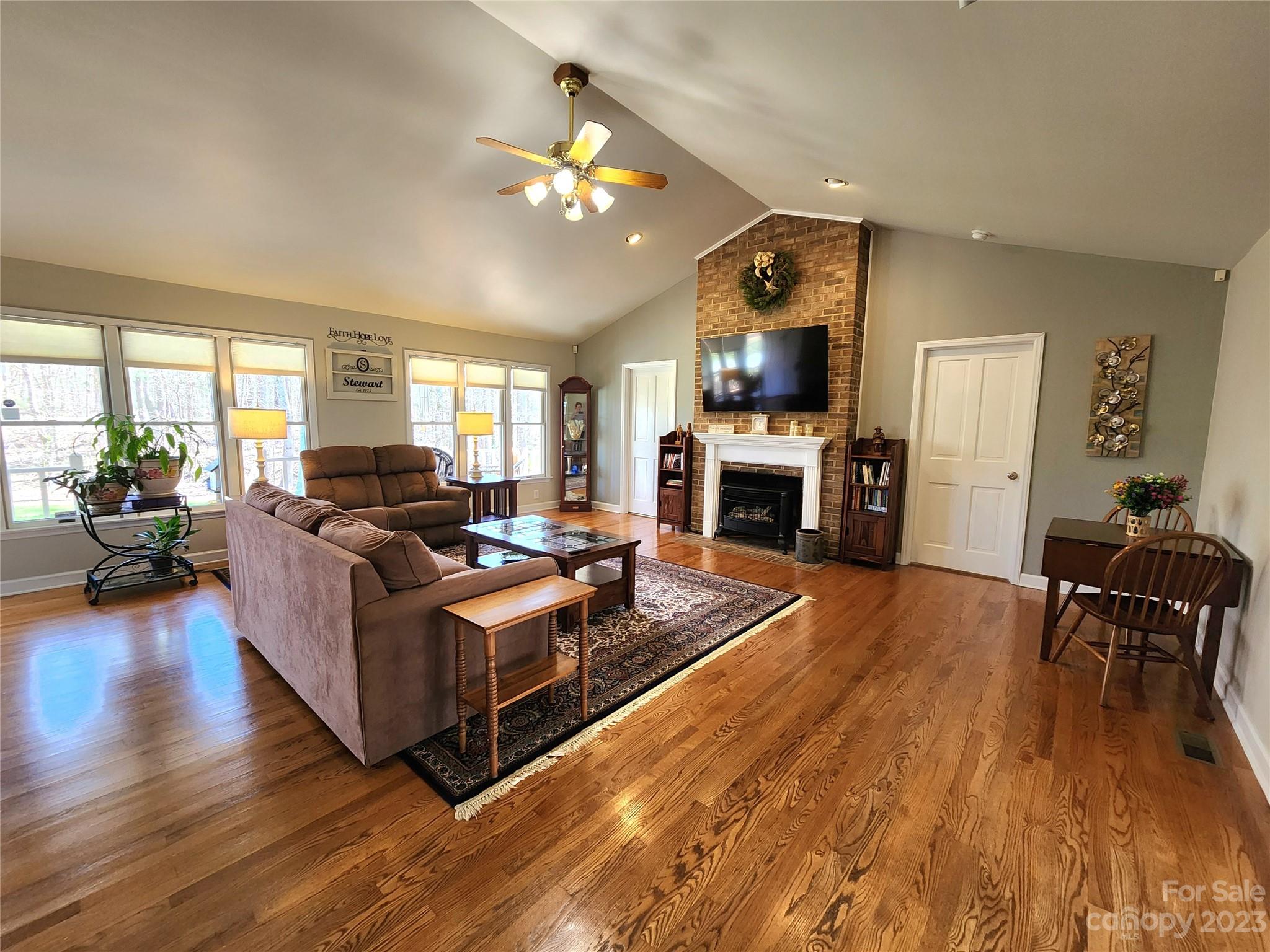 1101 Running Brook Road Midland, NC 28107 - Photo 8 of 48 a living room with furniture and a fireplace