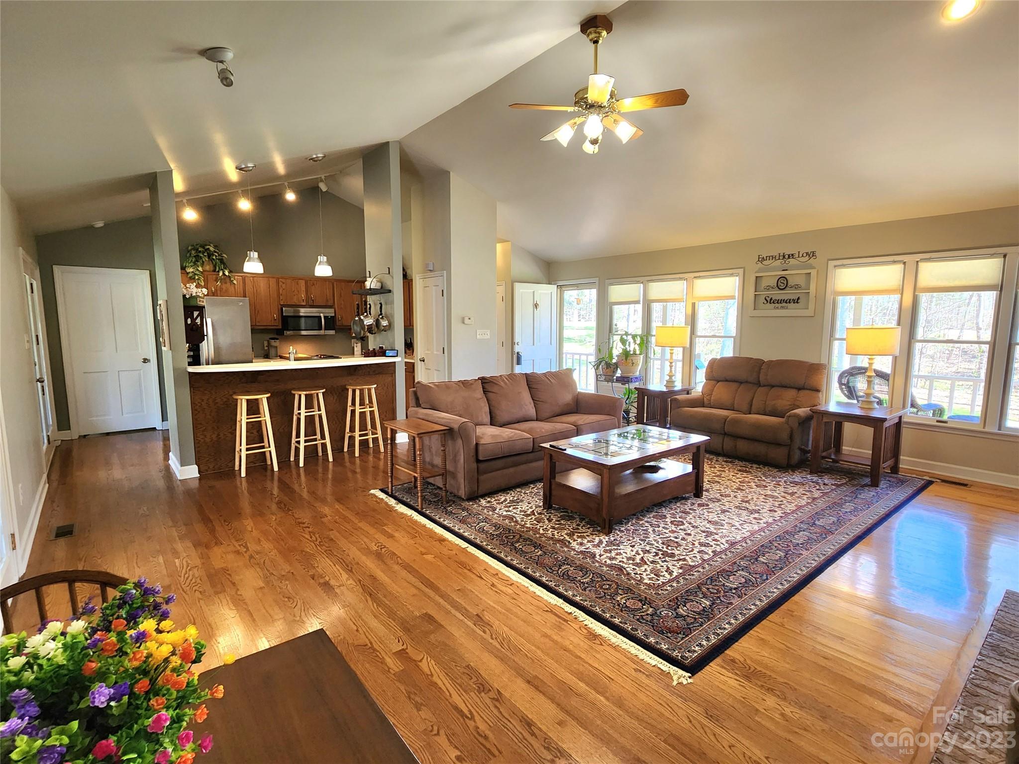 1101 Running Brook Road Midland, NC 28107 - Photo 10 of 48 a living room with furniture and a chandelier