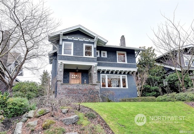 2818 Broadway East Seattle, WA 98102 - Photo 1 of 1 a front view of a house with garden