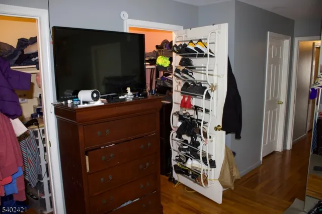 a bathroom with a sink mirror vanity and toilet