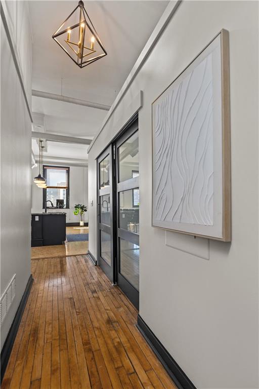 3080 Smallman Street, Unit 8 Pittsburgh, PA 15201 - Photo 11 of 39 a view of a hallway with wooden floor