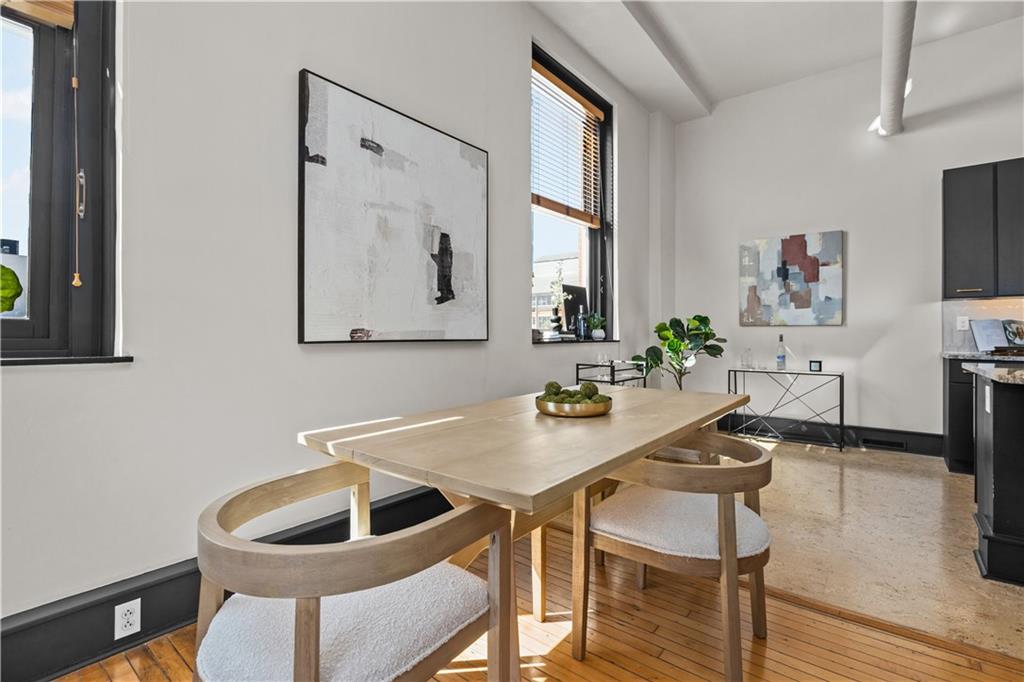 3080 Smallman Street, Unit 8 Pittsburgh, PA 15201 - Photo 18 of 39 a kitchen with a table and chairs
