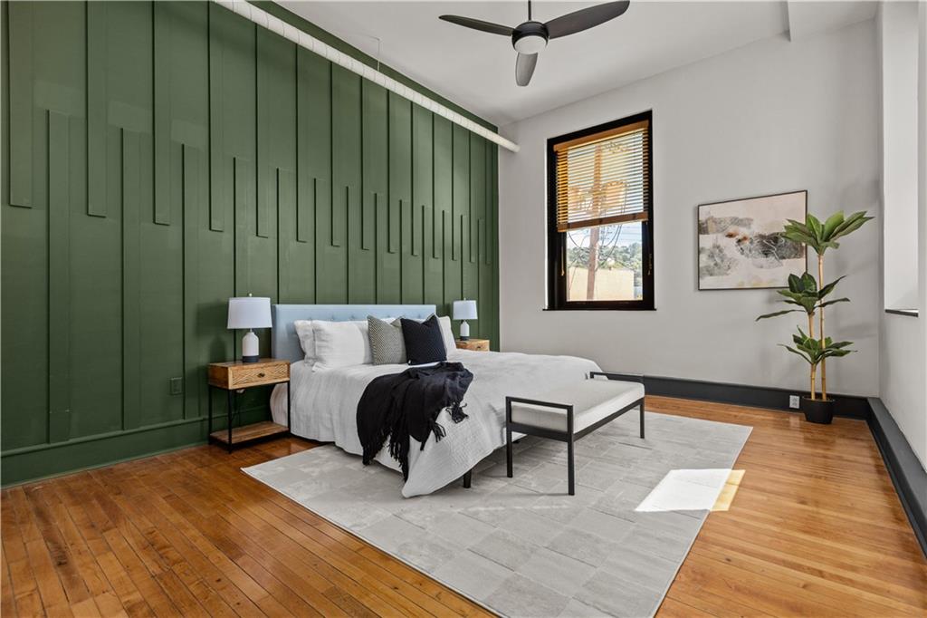 3080 Smallman Street, Unit 8 Pittsburgh, PA 15201 - Photo 25 of 39 a living room with furniture and a rug