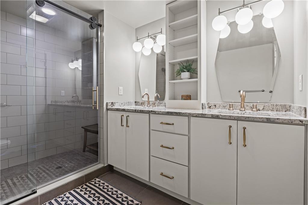 3080 Smallman Street, Unit 8 Pittsburgh, PA 15201 - Photo 28 of 39 a bathroom with a sink and a mirror
