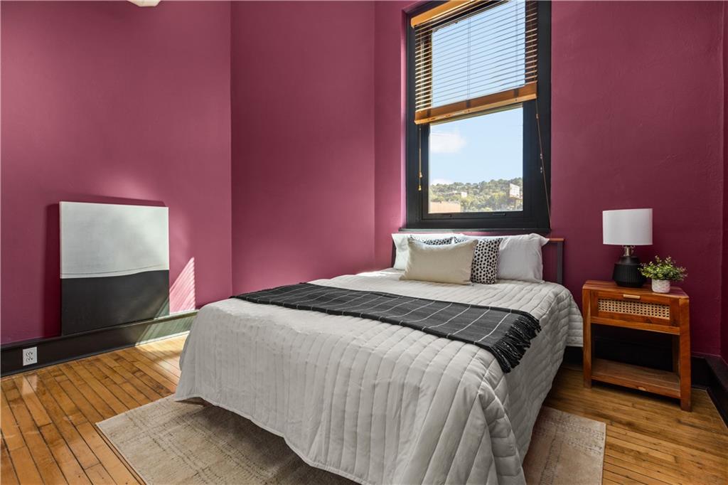 3080 Smallman Street, Unit 8 Pittsburgh, PA 15201 - Photo 29 of 39 a bedroom with a bed and a window