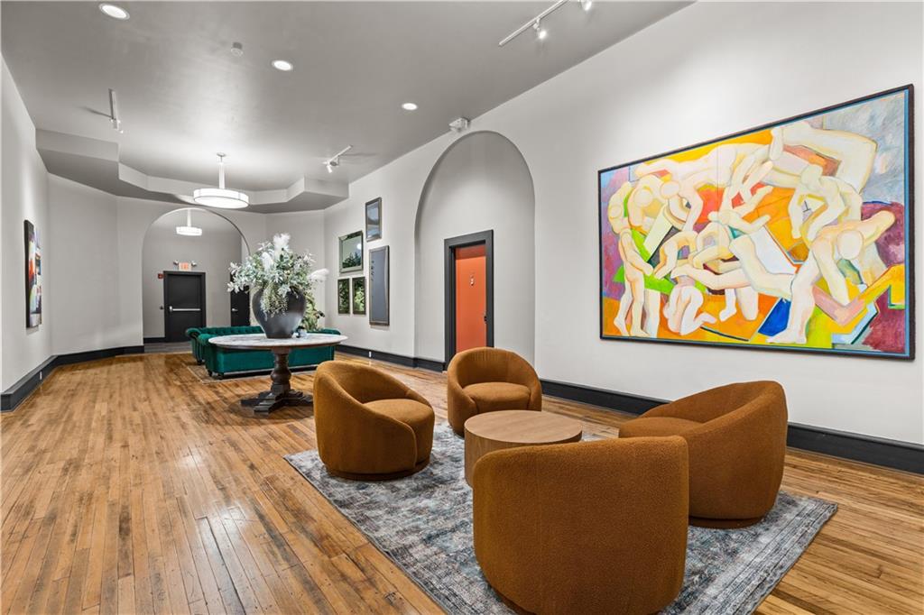 3080 Smallman Street, Unit 8 Pittsburgh, PA 15201 - Photo 5 of 39 a living room with furniture and wooden floor