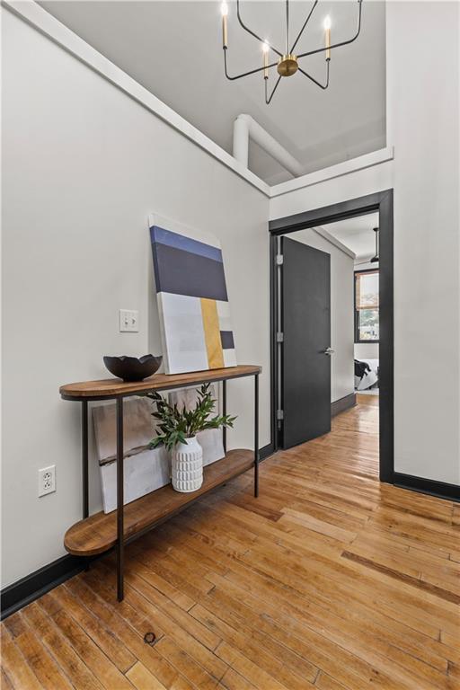 3080 Smallman Street, Unit 8 Pittsburgh, PA 15201 - Photo 9 of 39 a living room with furniture and a wooden floor