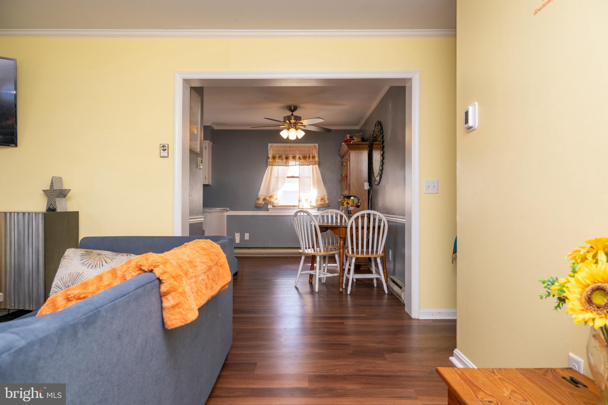 22400 Zoar Road Georgetown, DE 19947 - Photo 17 of 32 a view of a livingroom with furniture and wooden floor
