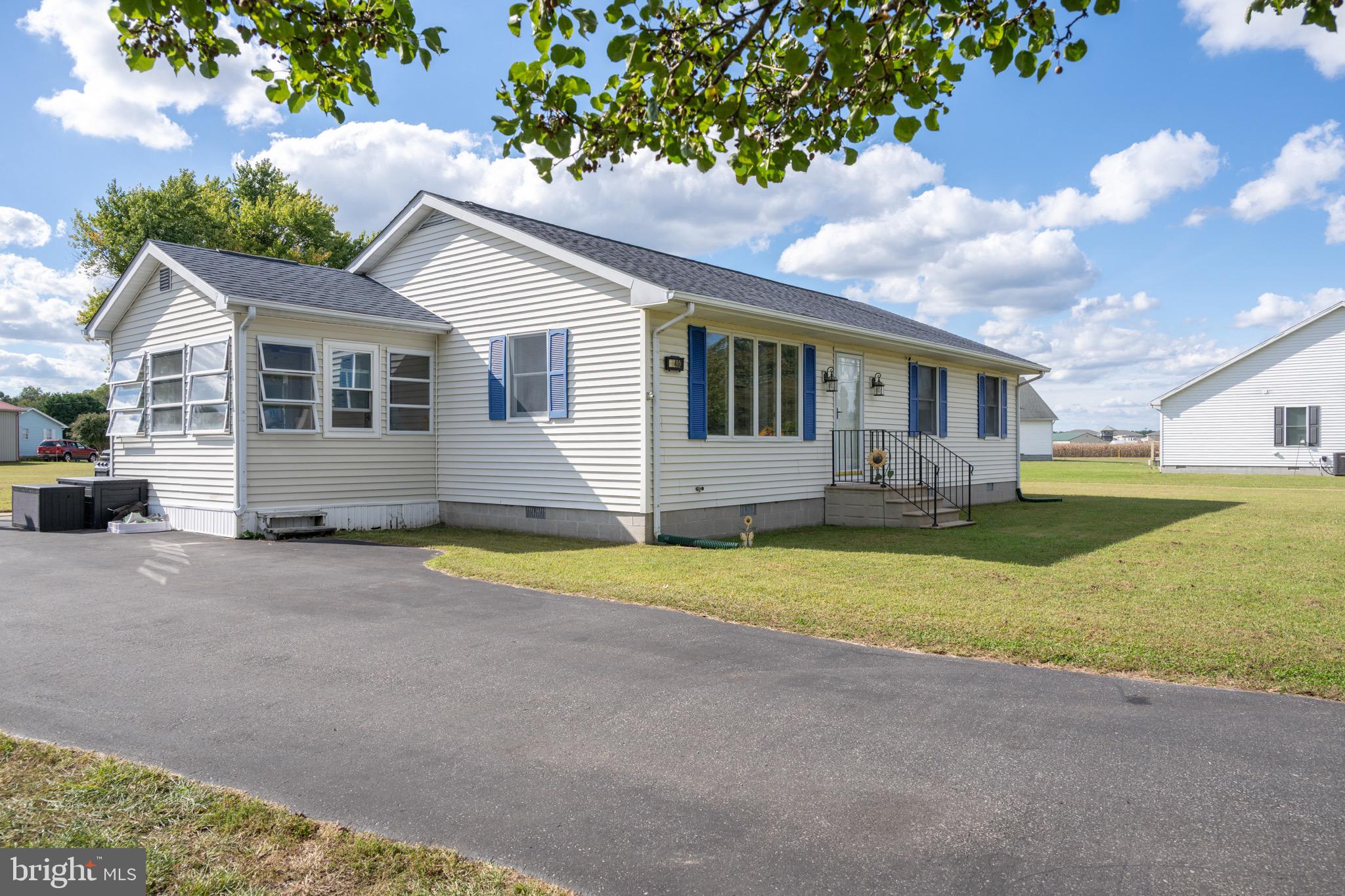 22400 Zoar Road Georgetown, DE 19947 - Photo 10 of 32 a front view of house with yard and trees