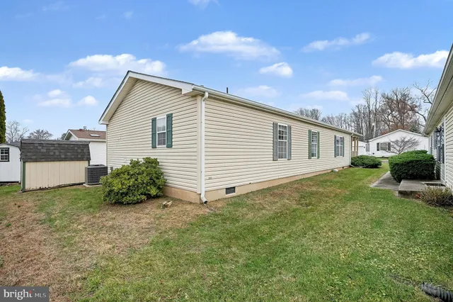 a view of a patio with wooden floor