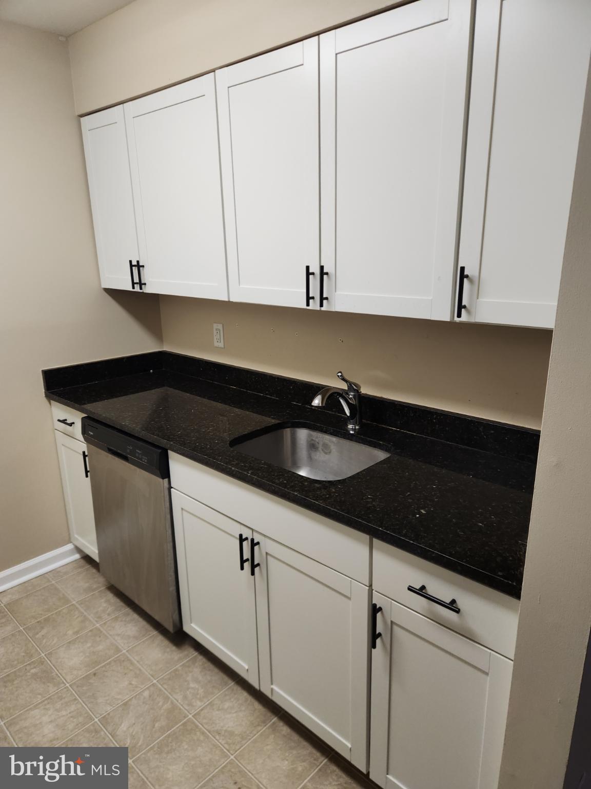 4934 Columbia Road, Unit 458 Columbia, MD 21044 - Photo 18 of 21 Sleek kitchen with modern finishes.