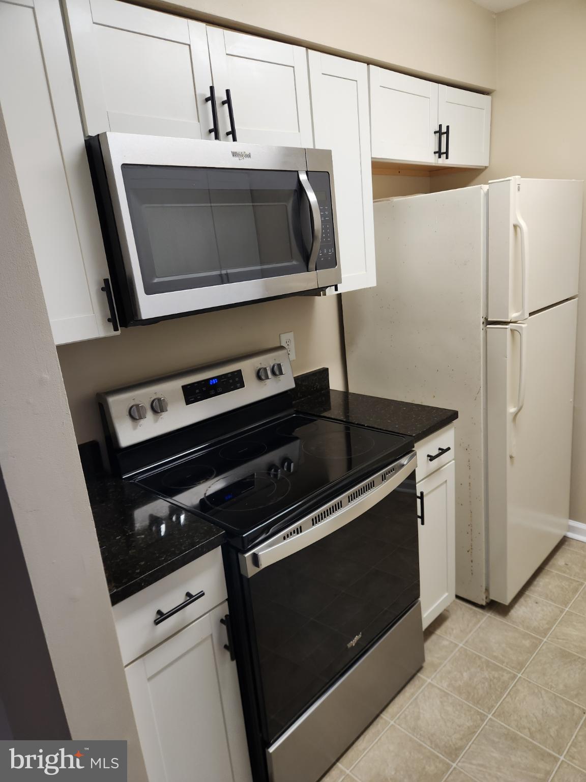 4934 Columbia Road, Unit 458 Columbia, MD 21044 - Photo 19 of 21 Modern kitchen with sleek appliances.
