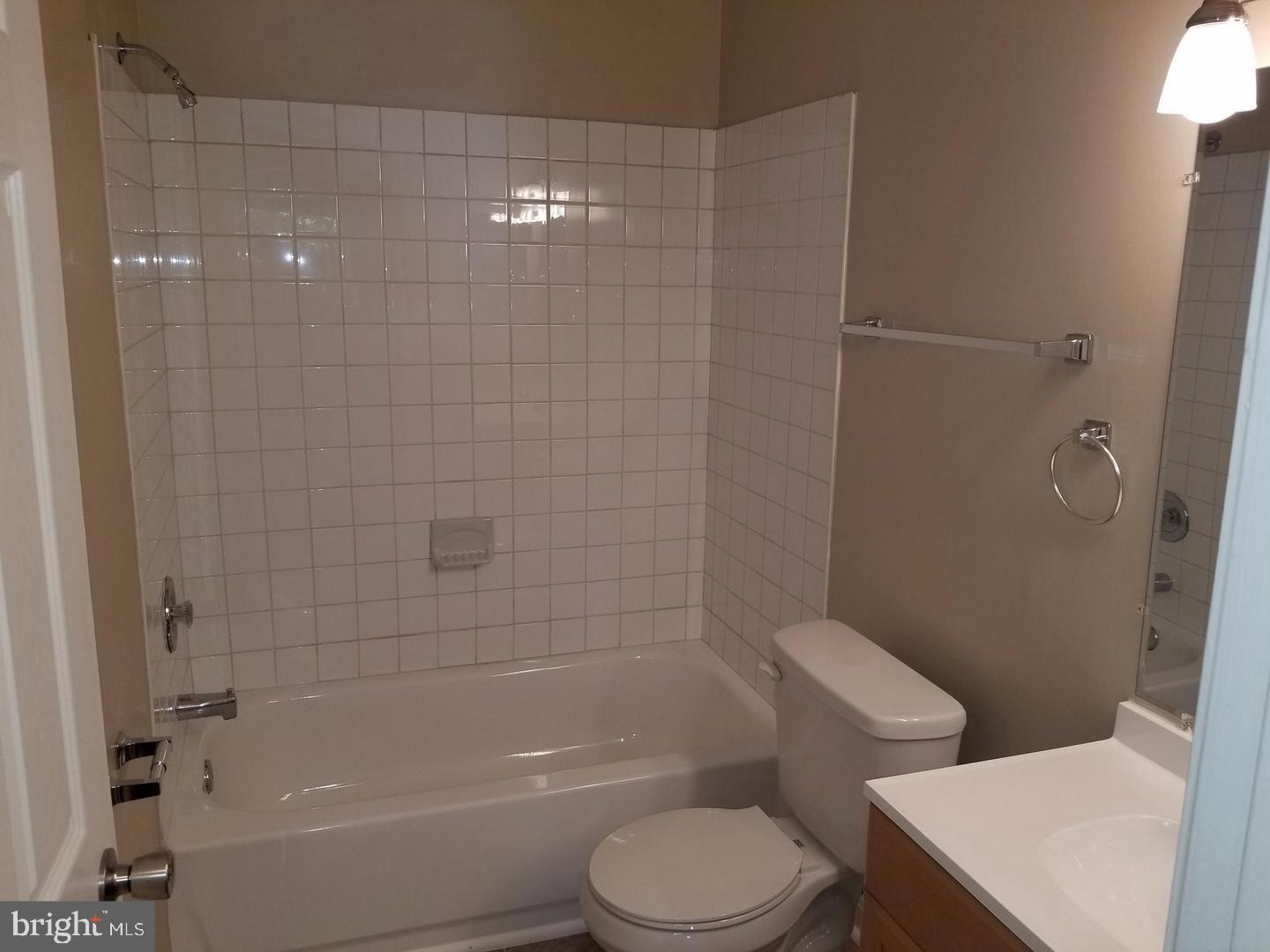 4934 Columbia Road, Unit 458 Columbia, MD 21044 - Photo 5 of 21 Modern bathroom with clean, tiled elegance.