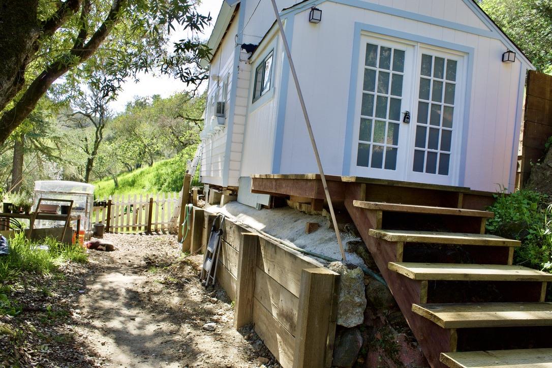 84 El Vanada Road, Unit B Redwood City, CA 94062 - Photo 1 of 1 a front view of a house with a garden