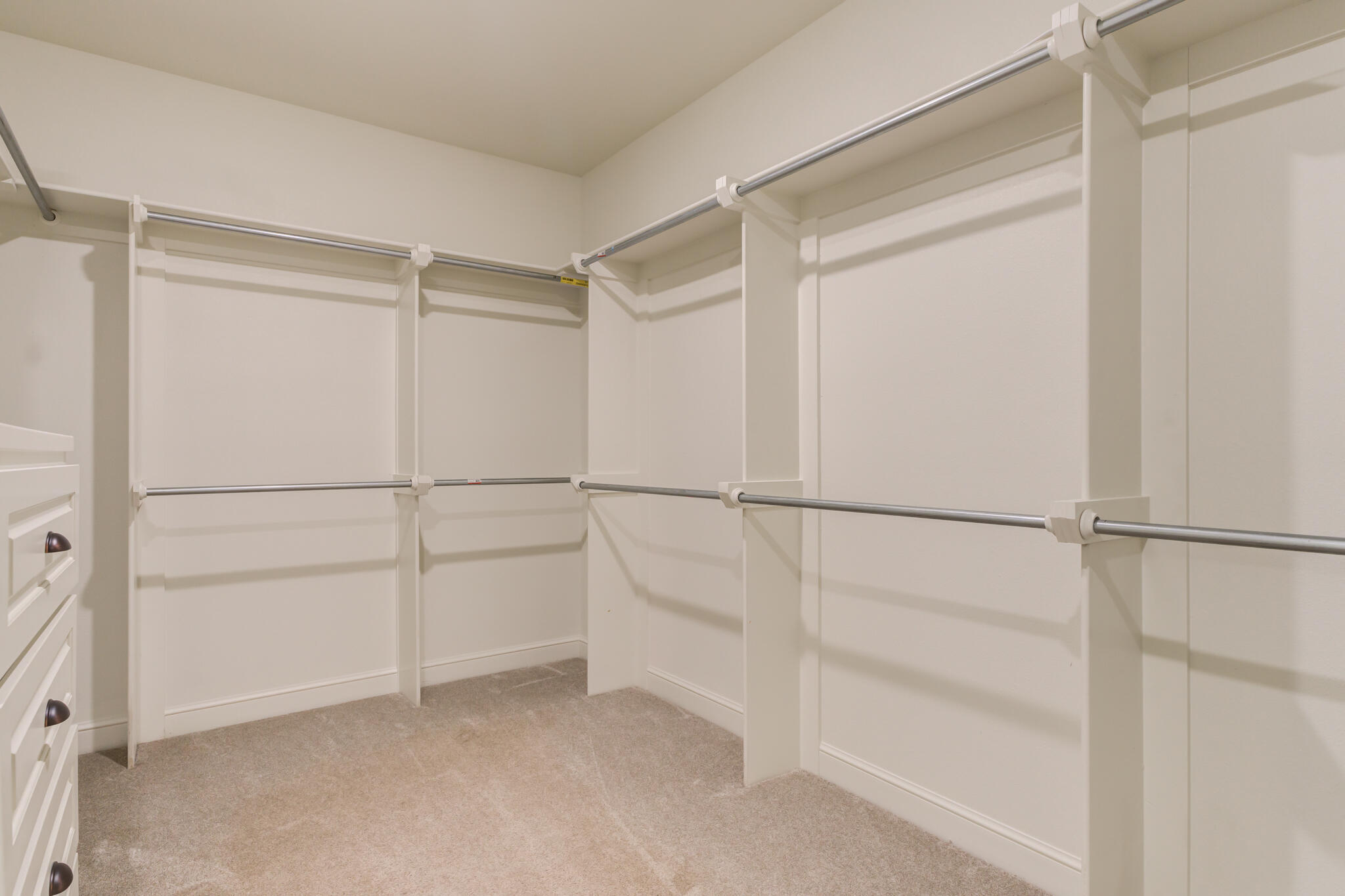 6908 55th Street Lubbock, TX 79407 - Photo 24 of 42 a view of an empty walk in closet