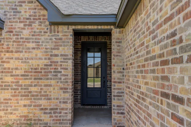 a front view of a house with an empty space