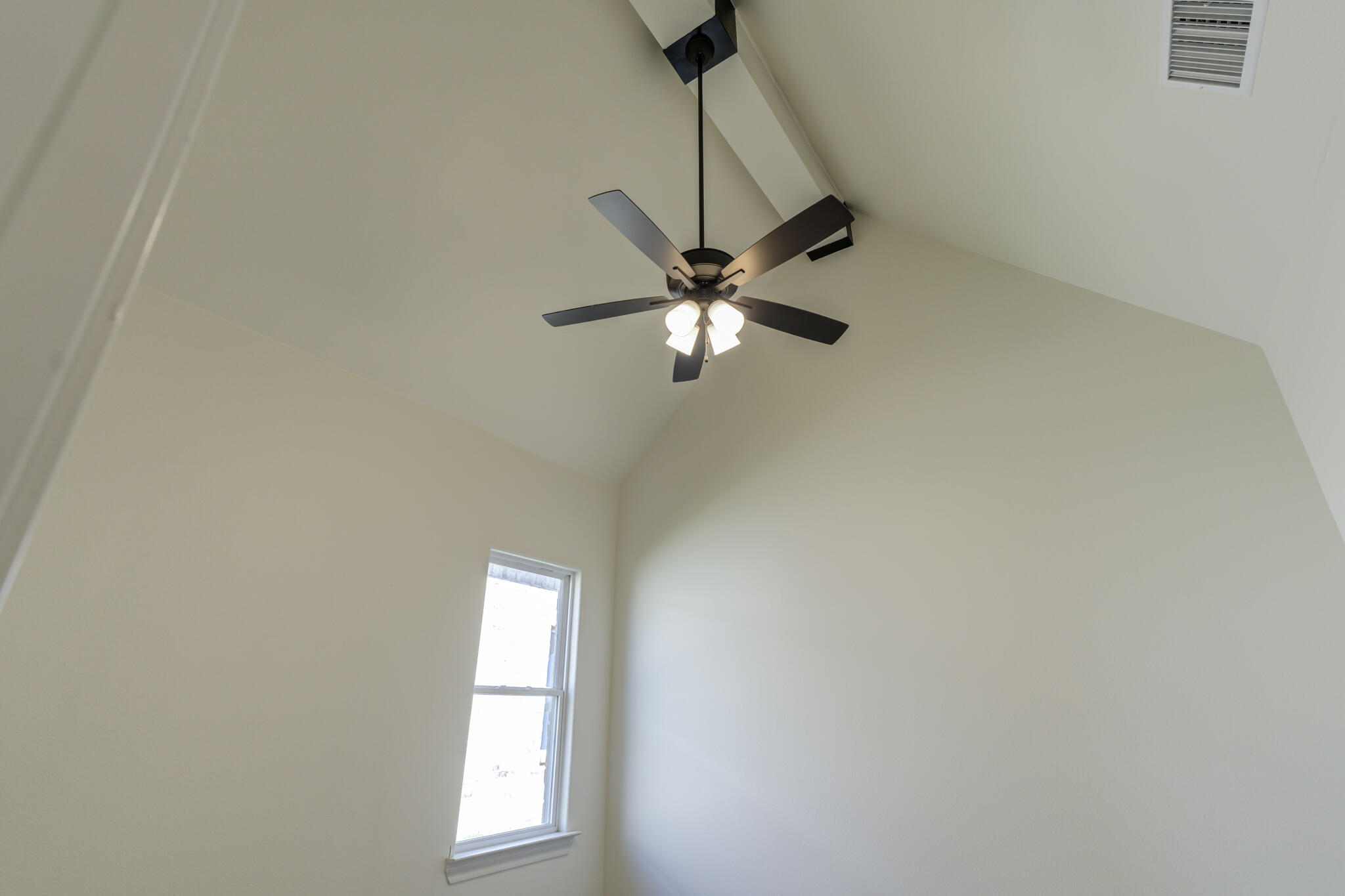 6908 55th Street Lubbock, TX 79407 - Photo 6 of 42 a view of a hallway with a window