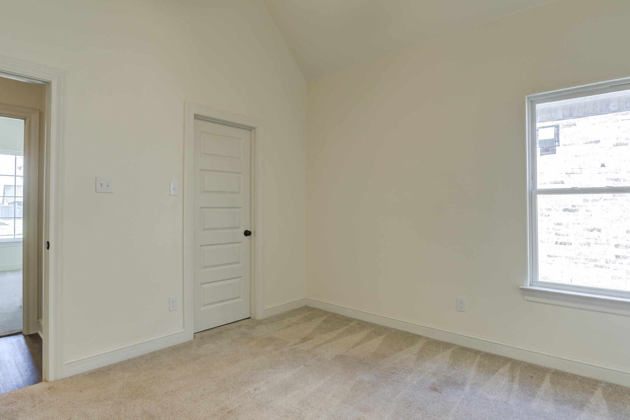 6908 55th Street Lubbock, TX 79407 - Photo 7 of 42 an empty room with windows