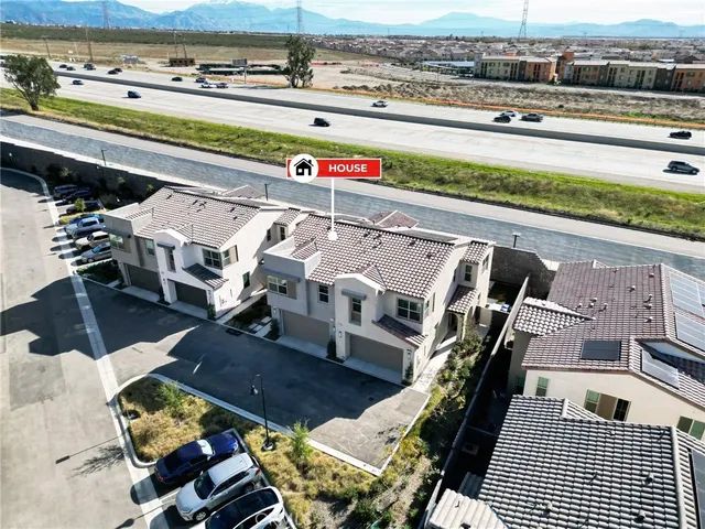 a view of a street with a building