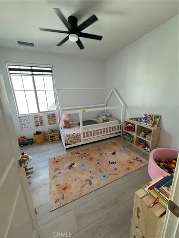a view of kitchen with sink cabinet and window