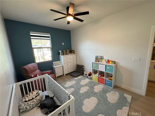 a bathroom with a tub a sink and mirror
