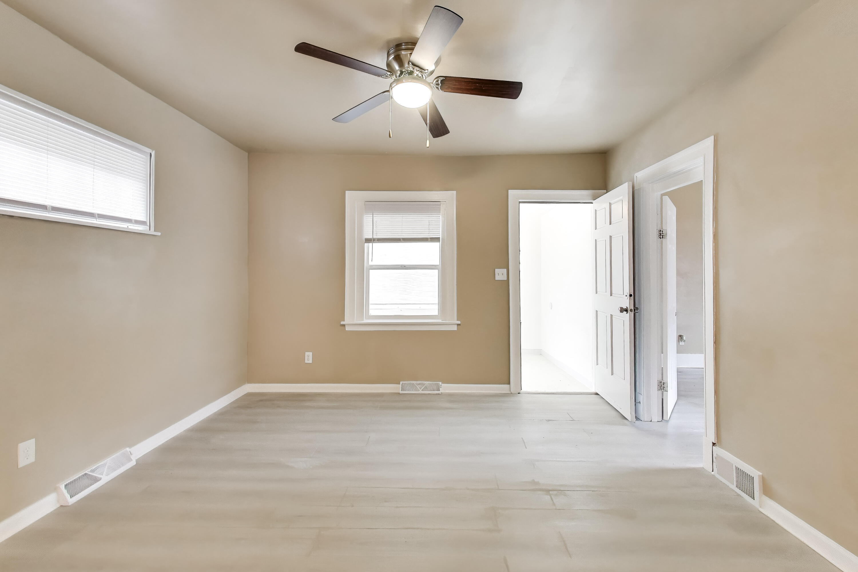 329 Pierce Street Gary, IN 46402 - Photo 5 of 17 a view of livingroom with window and ceiling fan
