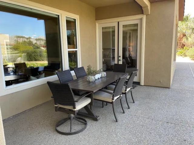 a view of a lake with a house in the background