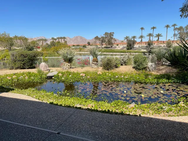 a view of a street with a park