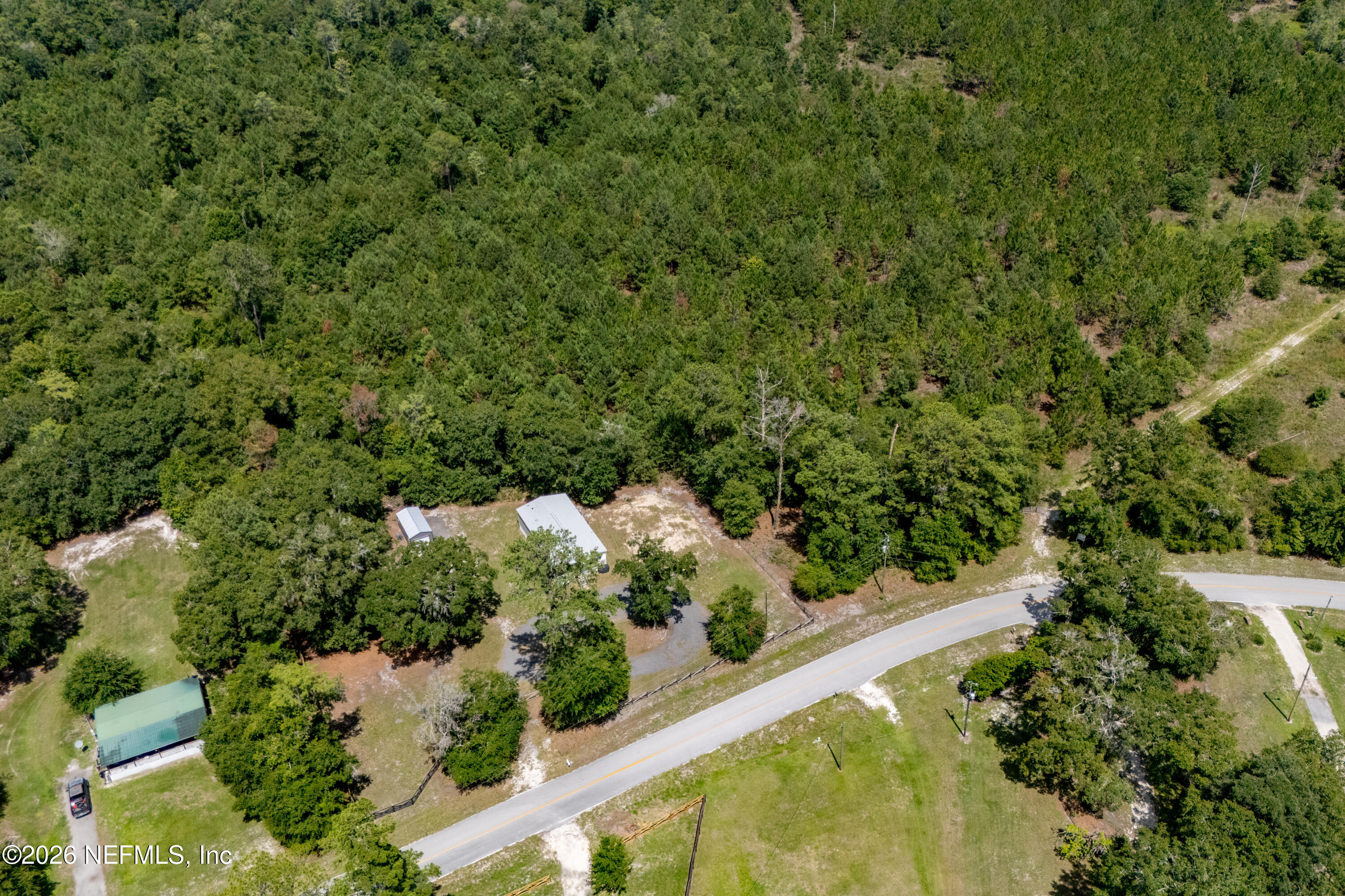15049 Southwest 75th Avenue Starke, FL 32091 - Photo 31 of 64 a view of a garden with plants
