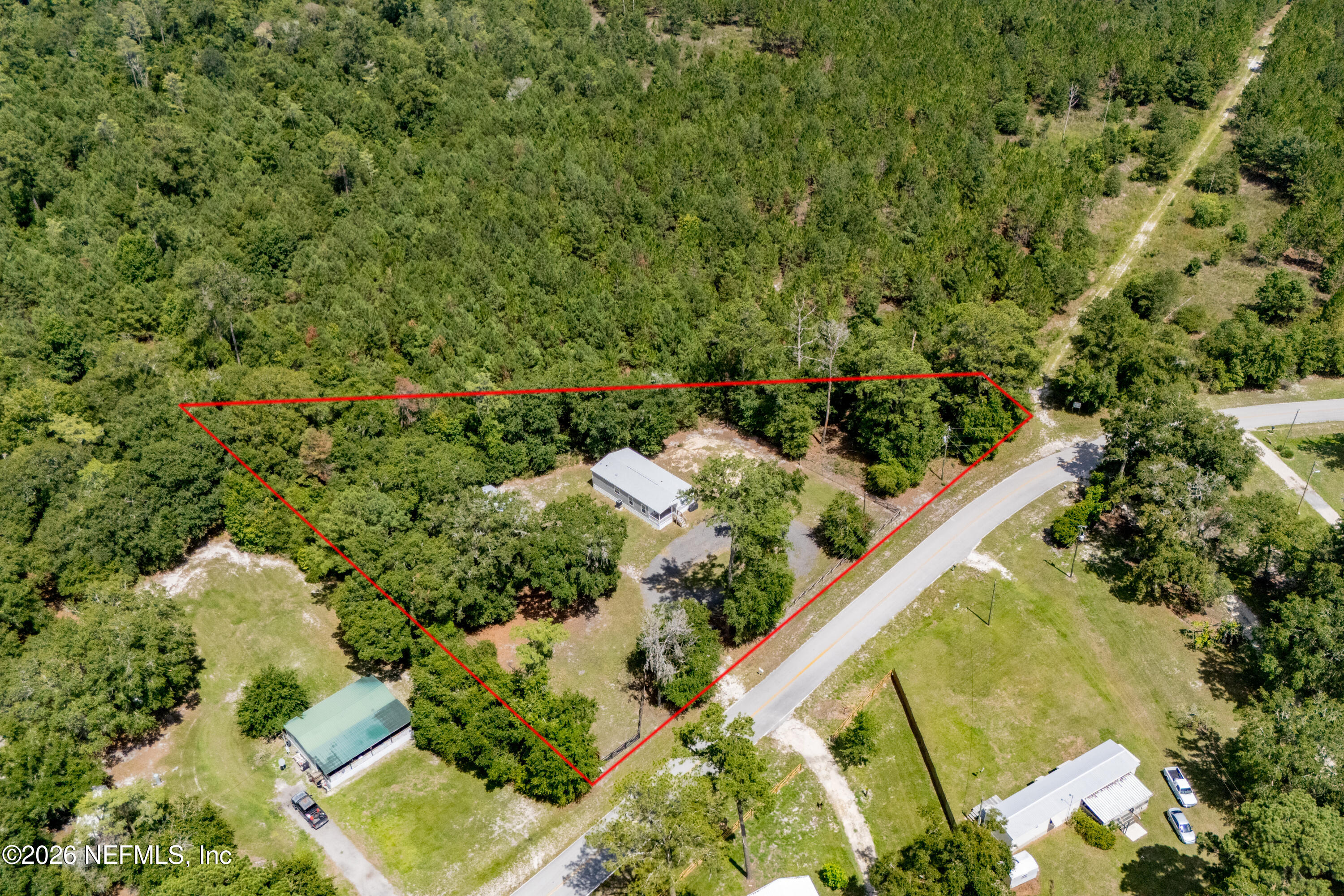 15049 Southwest 75th Avenue Starke, FL 32091 - Photo 32 of 64 a view of a garden with plants