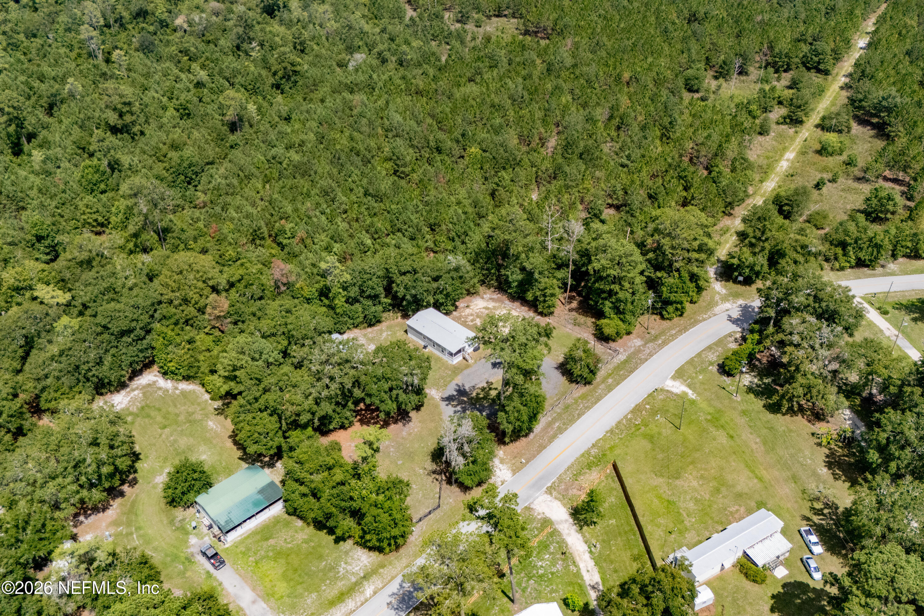 15049 Southwest 75th Avenue Starke, FL 32091 - Photo 33 of 64 a view of a garden with an outdoor space