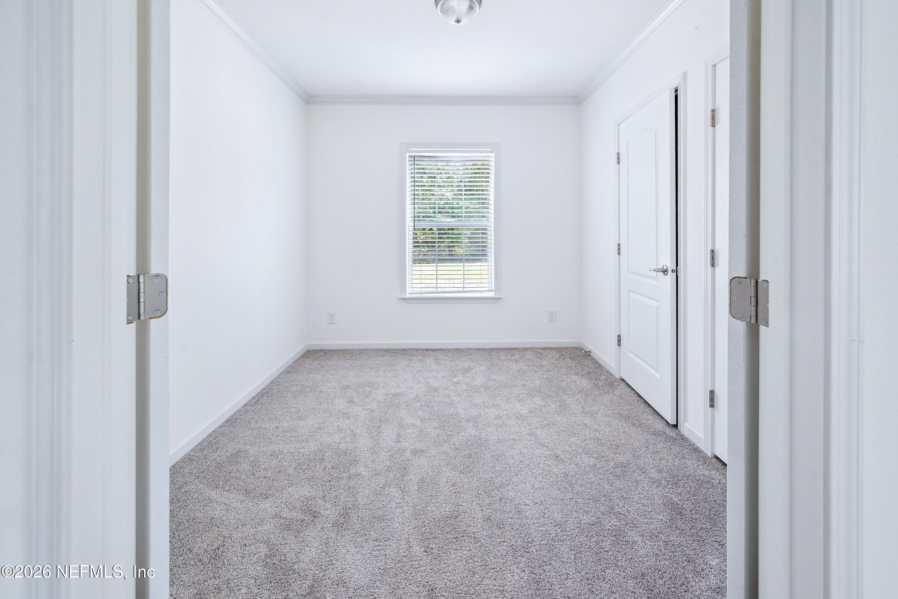 15049 Southwest 75th Avenue Starke, FL 32091 - Photo 48 of 64 a view of an empty room with a window