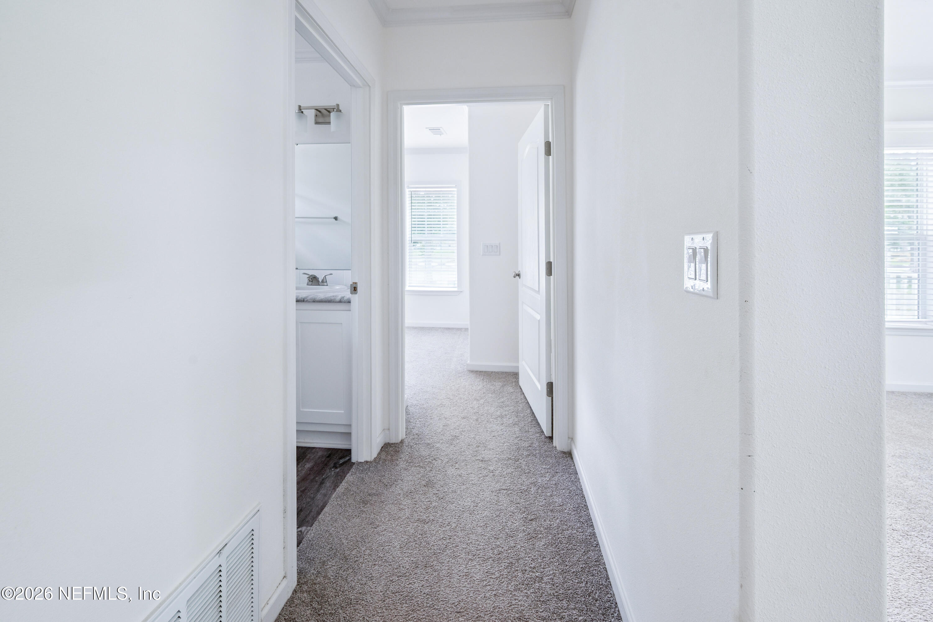 15049 Southwest 75th Avenue Starke, FL 32091 - Photo 50 of 64 a view of a hallway with wooden floor