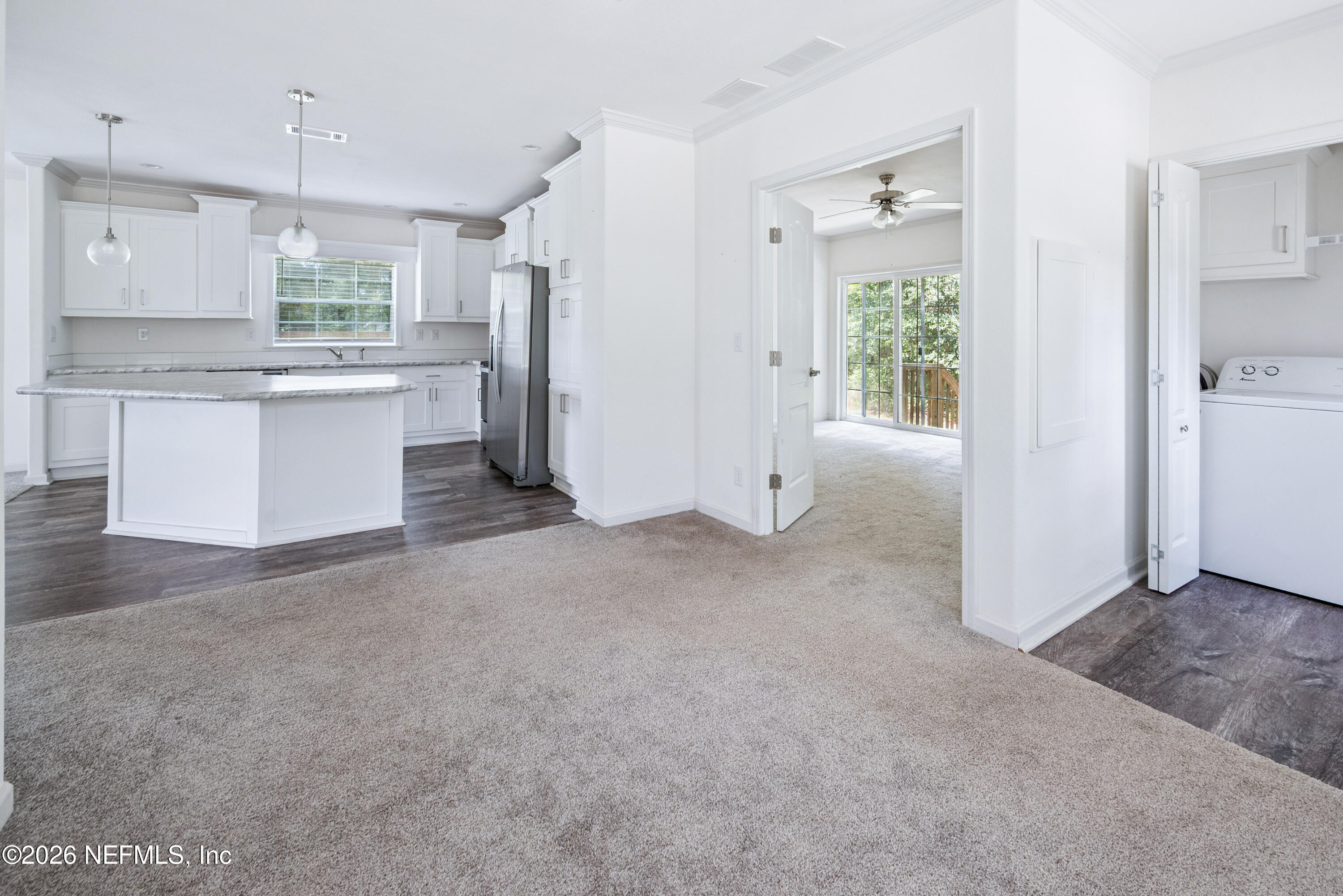 15049 Southwest 75th Avenue Starke, FL 32091 - Photo 58 of 64 a view of a kitchen with refrigerator and window