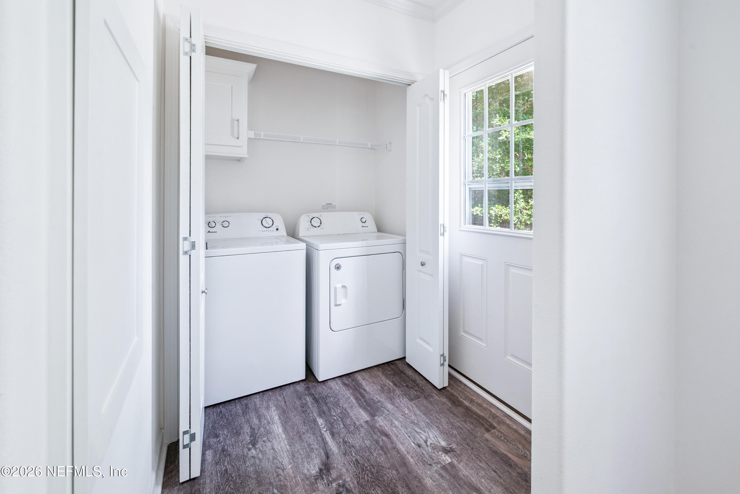 15049 Southwest 75th Avenue Starke, FL 32091 - Photo 59 of 64 a view of utility room with dryer and washer