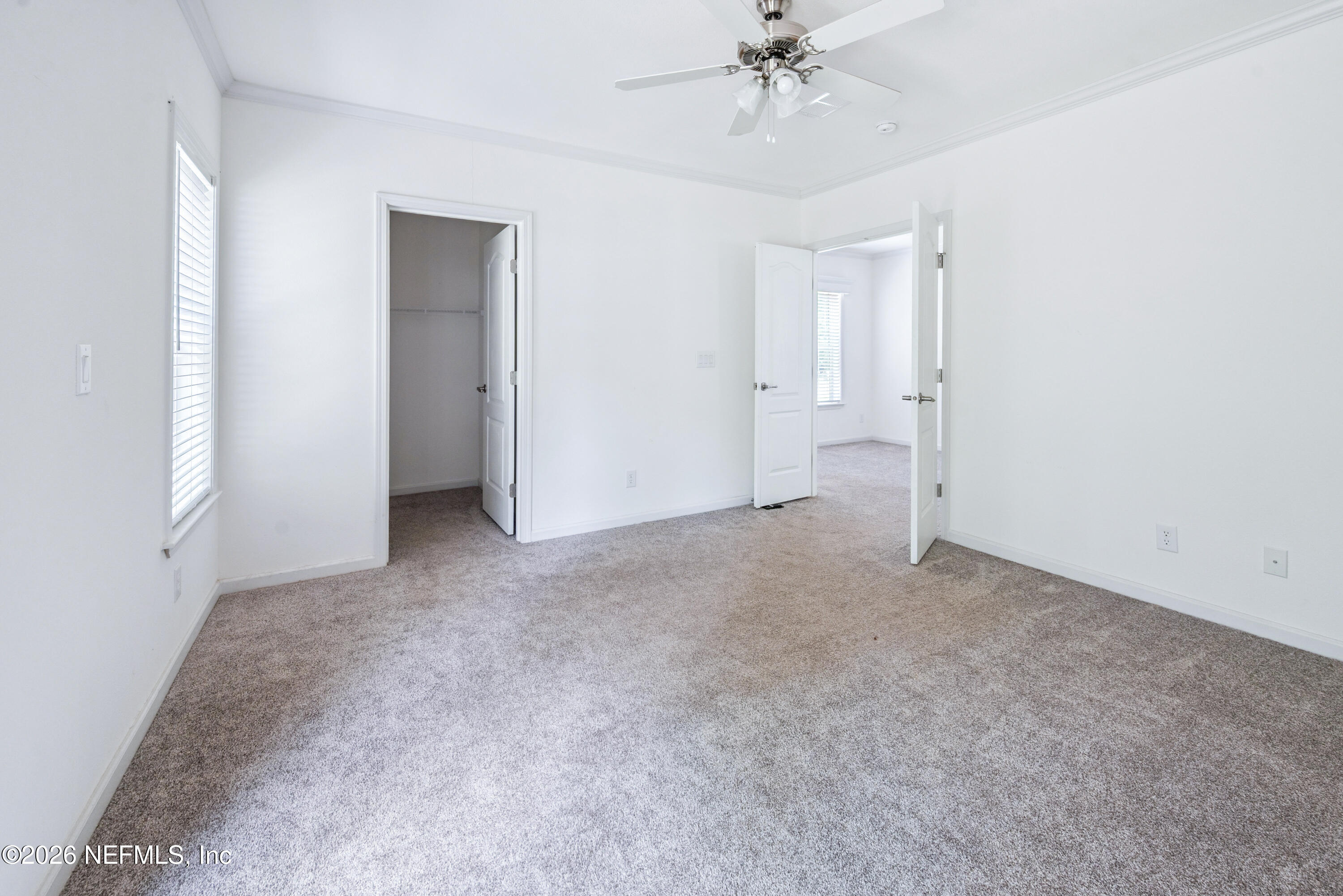 15049 Southwest 75th Avenue Starke, FL 32091 - Photo 61 of 64 a view of an empty room with a chandelier fan