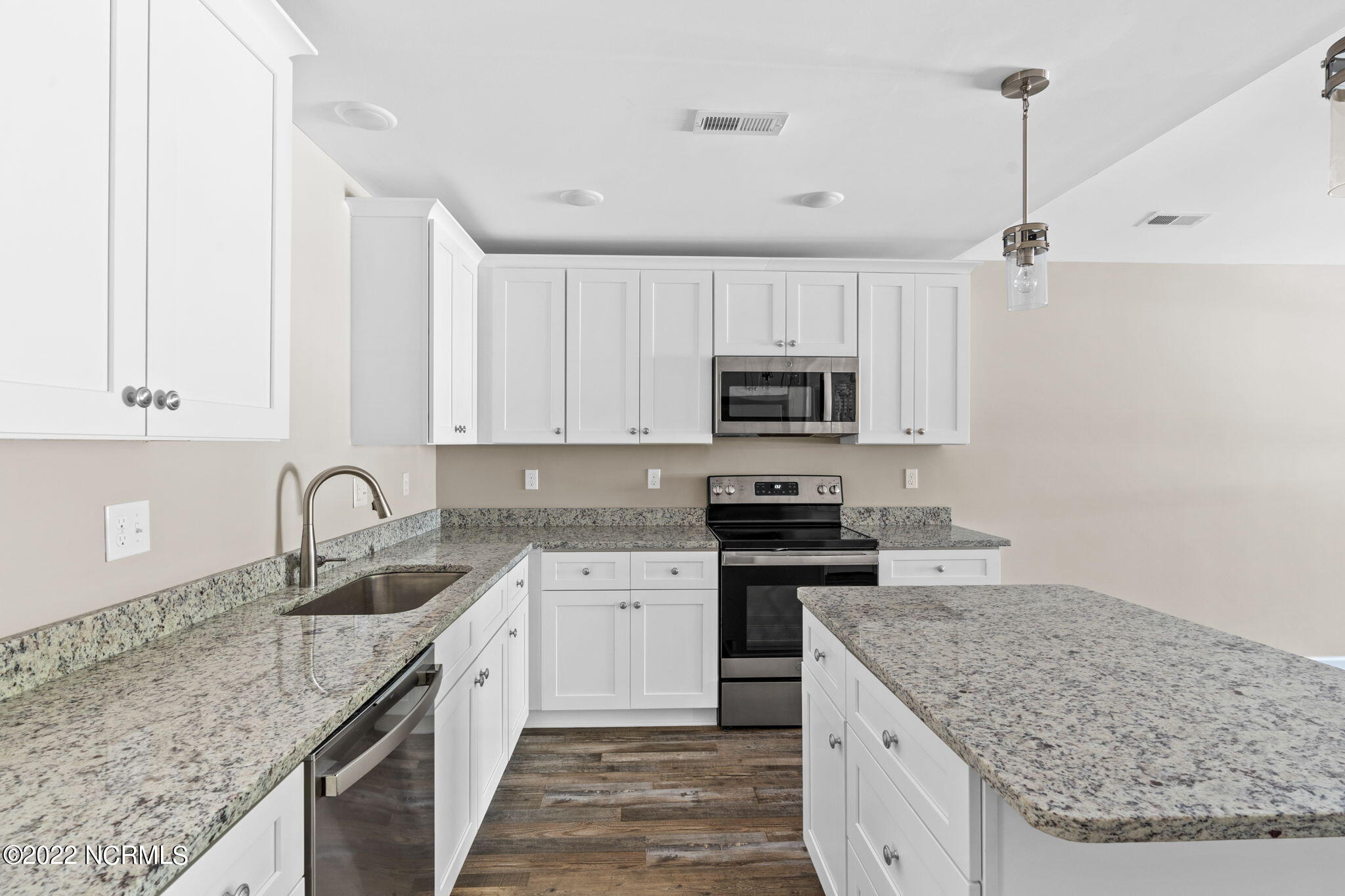 149 Elm Road Southport, NC 28461 - Photo 12 of 44 09 Kitchen Elm Side view