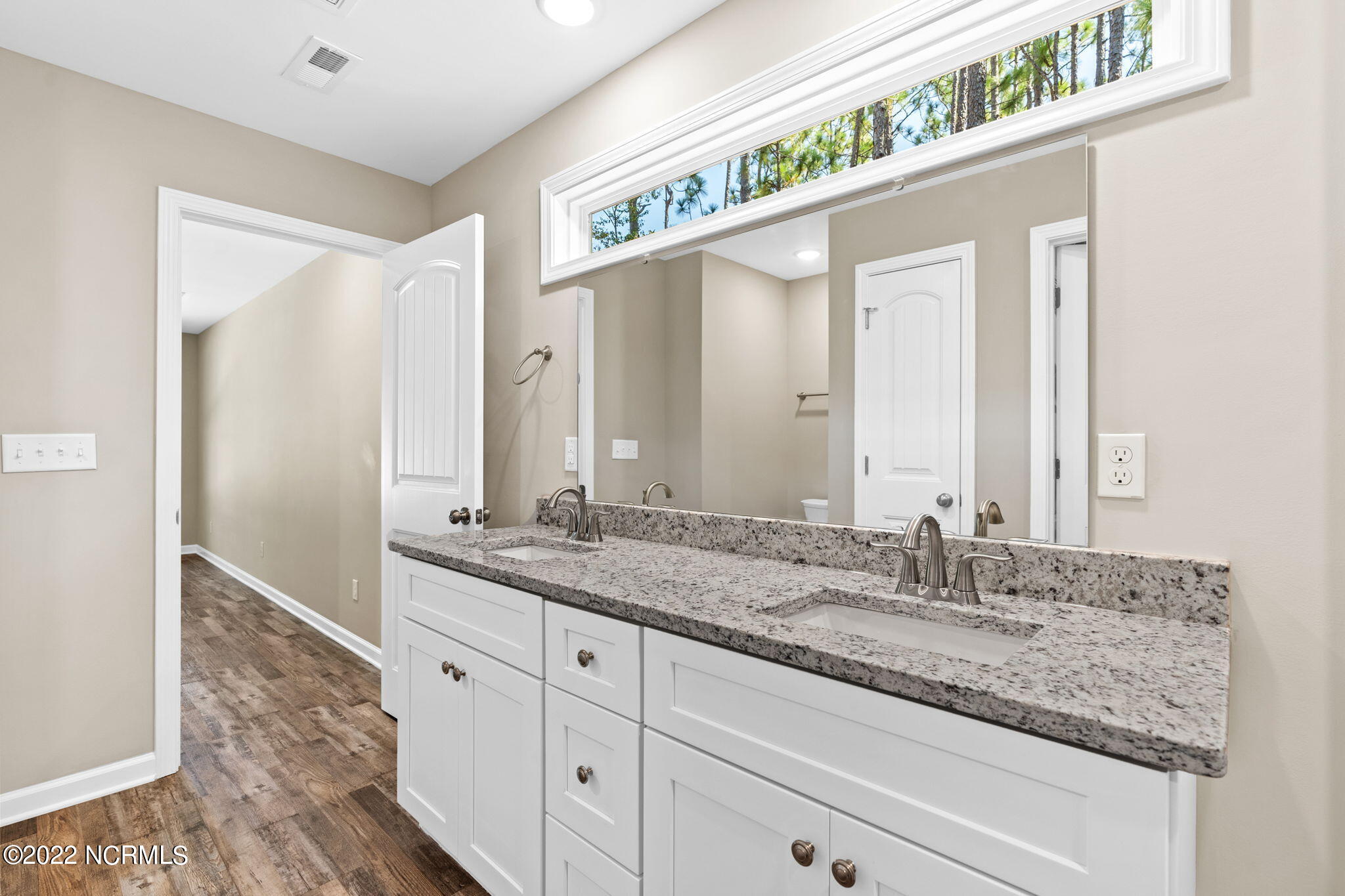 149 Elm Road Southport, NC 28461 - Photo 23 of 44 15 Master Bath vanity