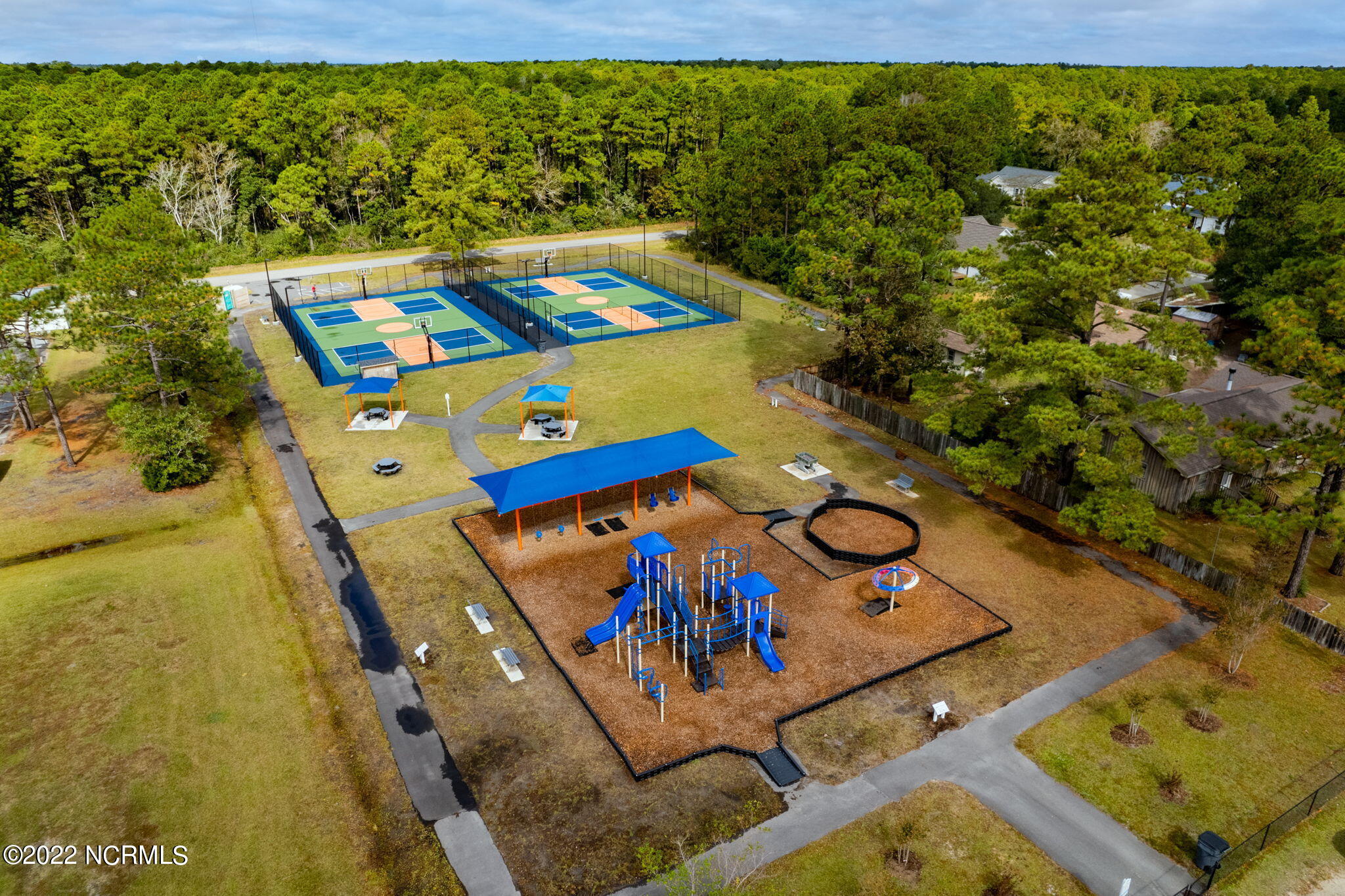 149 Elm Road Southport, NC 28461 - Photo 40 of 44 10 BSL Playground Tennis Courts