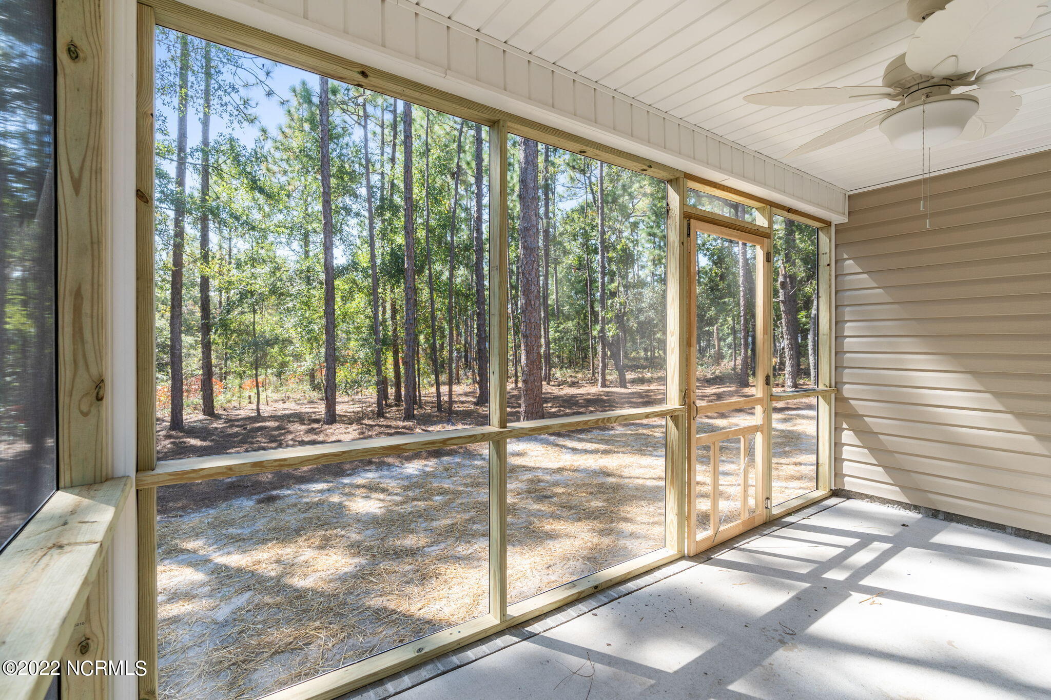 149 Elm Road Southport, NC 28461 - Photo 9 of 44 28 Porch to side