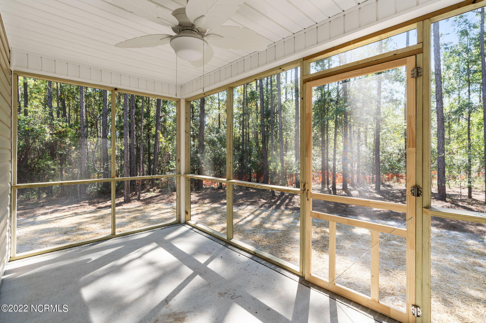 149 Elm Road Southport, NC 28461 - Photo 10 of 44 27 Screened porch to back