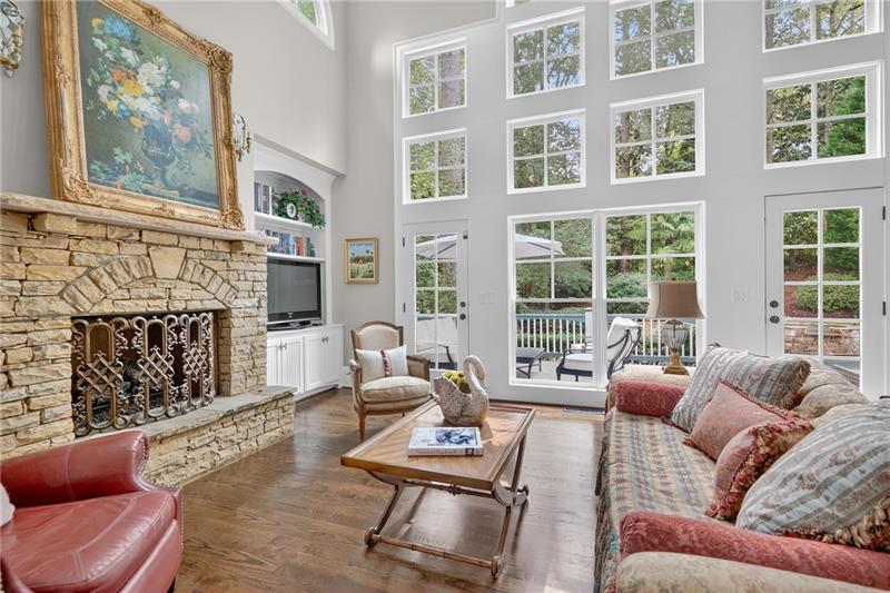 3100 Rhodenhaven Drive Northwest Atlanta, GA 30327 - Photo 11 of 52 a living room with furniture and a fireplace