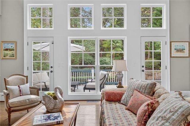 a bedroom with furniture and windows