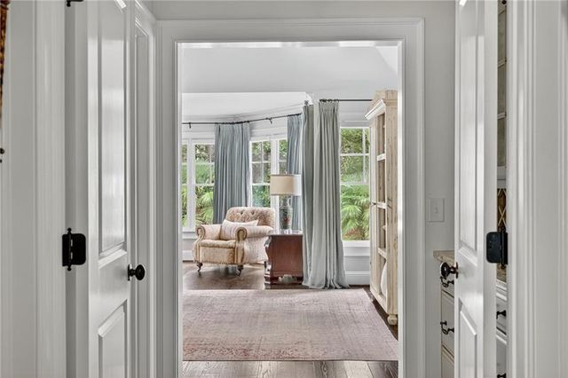 a view of a bathroom from a hallway