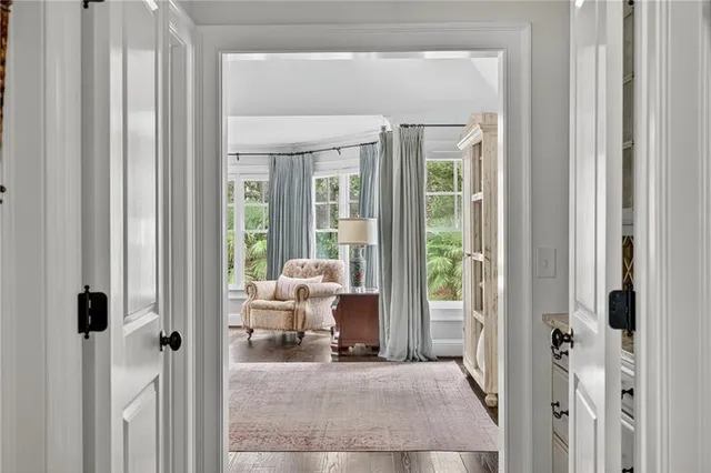 a view of a bathroom from a hallway