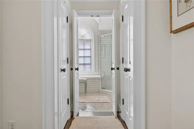 a bathroom with a tub and a sink