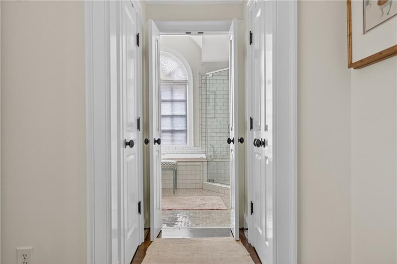 3100 Rhodenhaven Drive Northwest Atlanta, GA 30327 - Photo 23 of 52 a view of a bathroom from a hallway