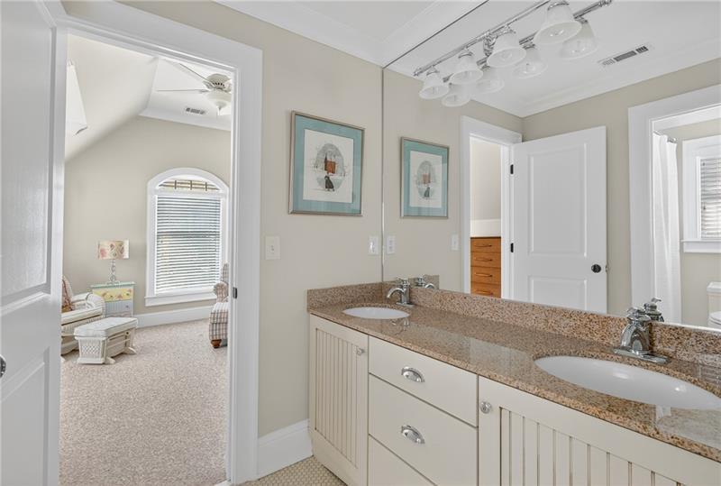 3100 Rhodenhaven Drive Northwest Atlanta, GA 30327 - Photo 35 of 52 a bathroom with a granite countertop sink and a mirror